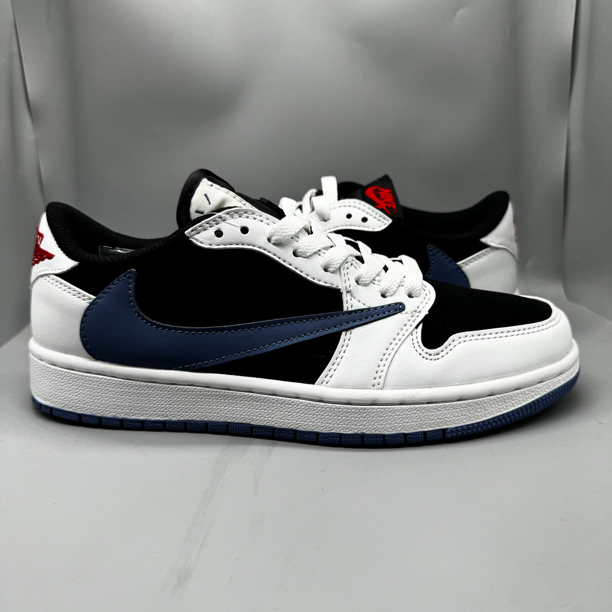 Travis Scott x Air Jordan 1 Retro Low OG SP Lightning – White, Black & Blue