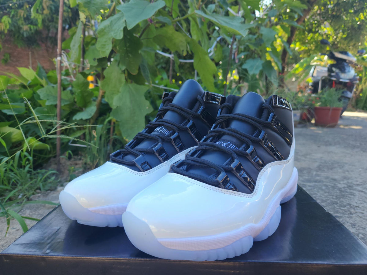 Air Jordan 11 White & Black Sneakers