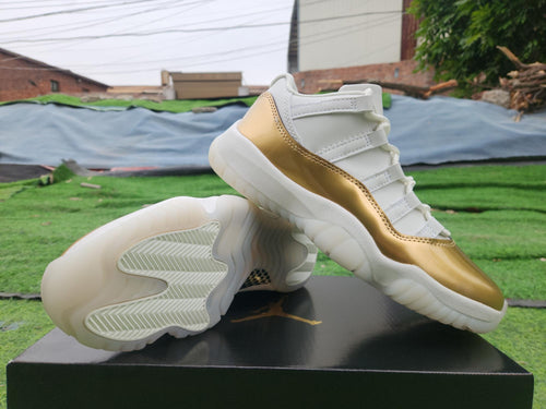 Air Jordan 11 Low White & Gold Sneakers