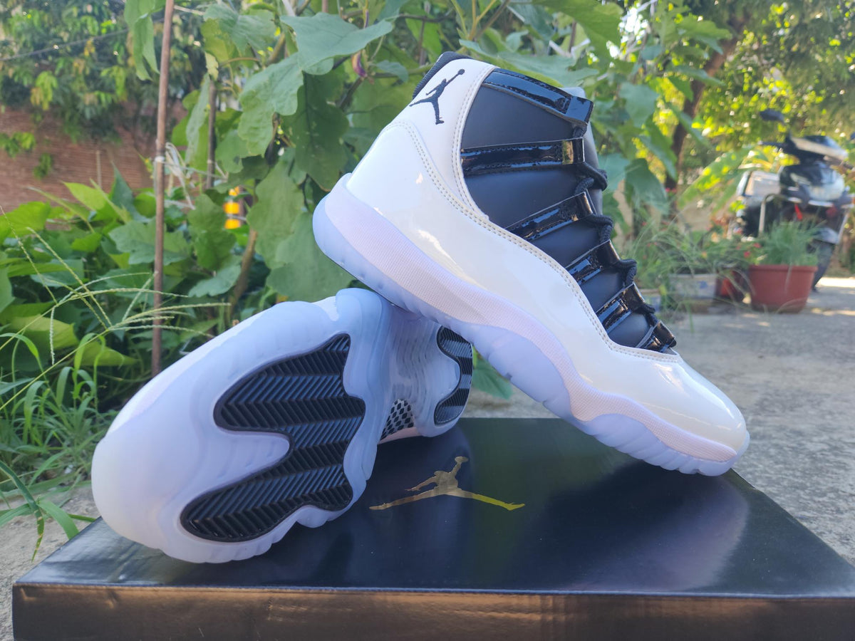 Air Jordan 11 White & Black Sneakers