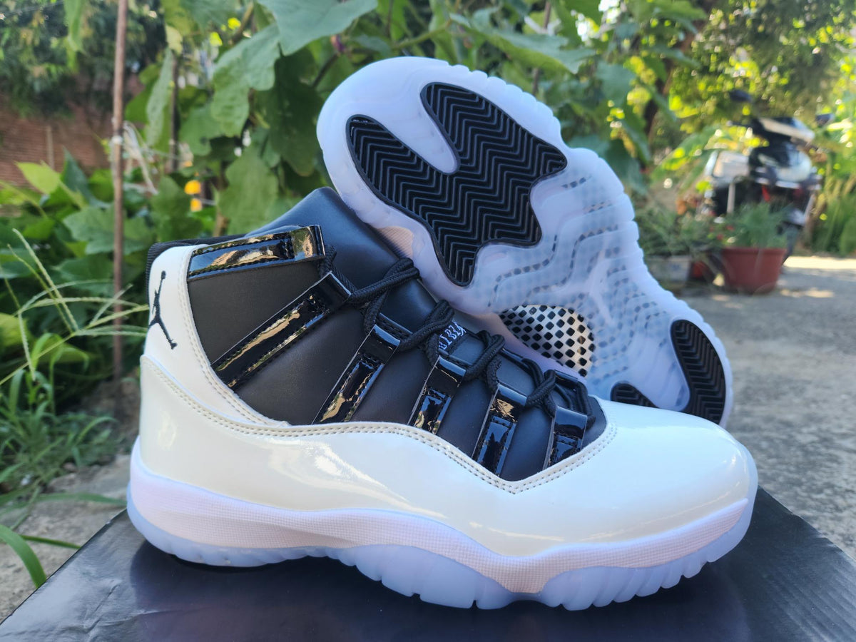 Air Jordan 11 White & Black Sneakers