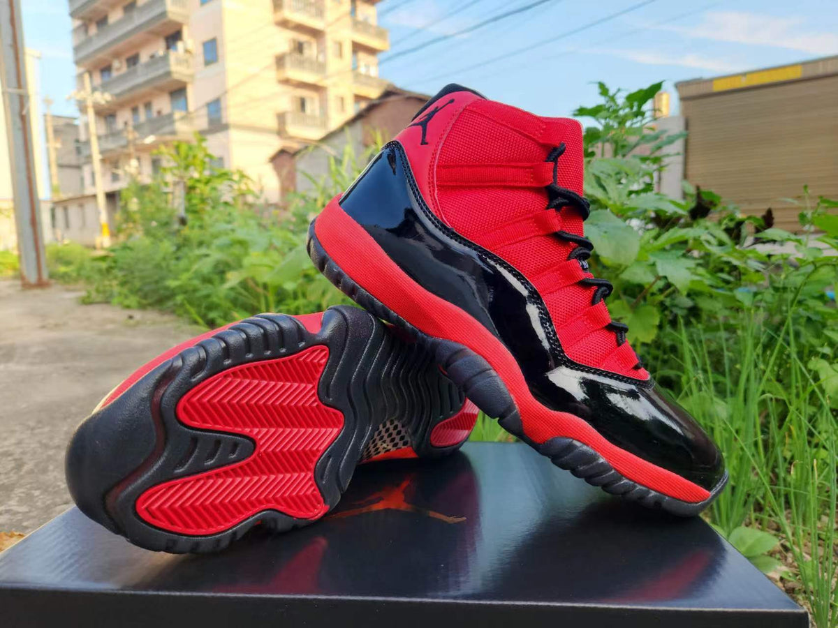 Air Jordan 11 Sneakers – Red & Black