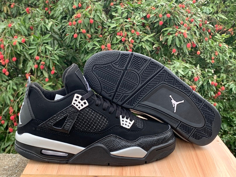 Air Jordan 4 “Spotlight” Sneakers – Black & White