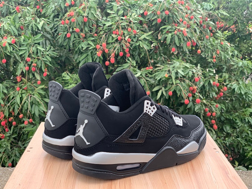 Air Jordan 4 “Spotlight” Sneakers – Black & White