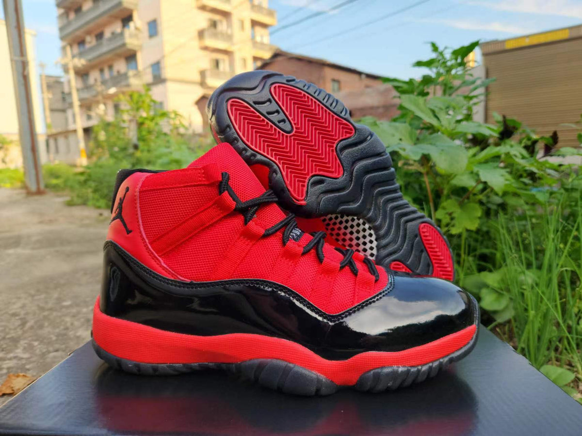 Air Jordan 11 Sneakers – Red & Black