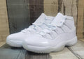Air Jordan 11 Cream & Black Sneakers for Men & Women