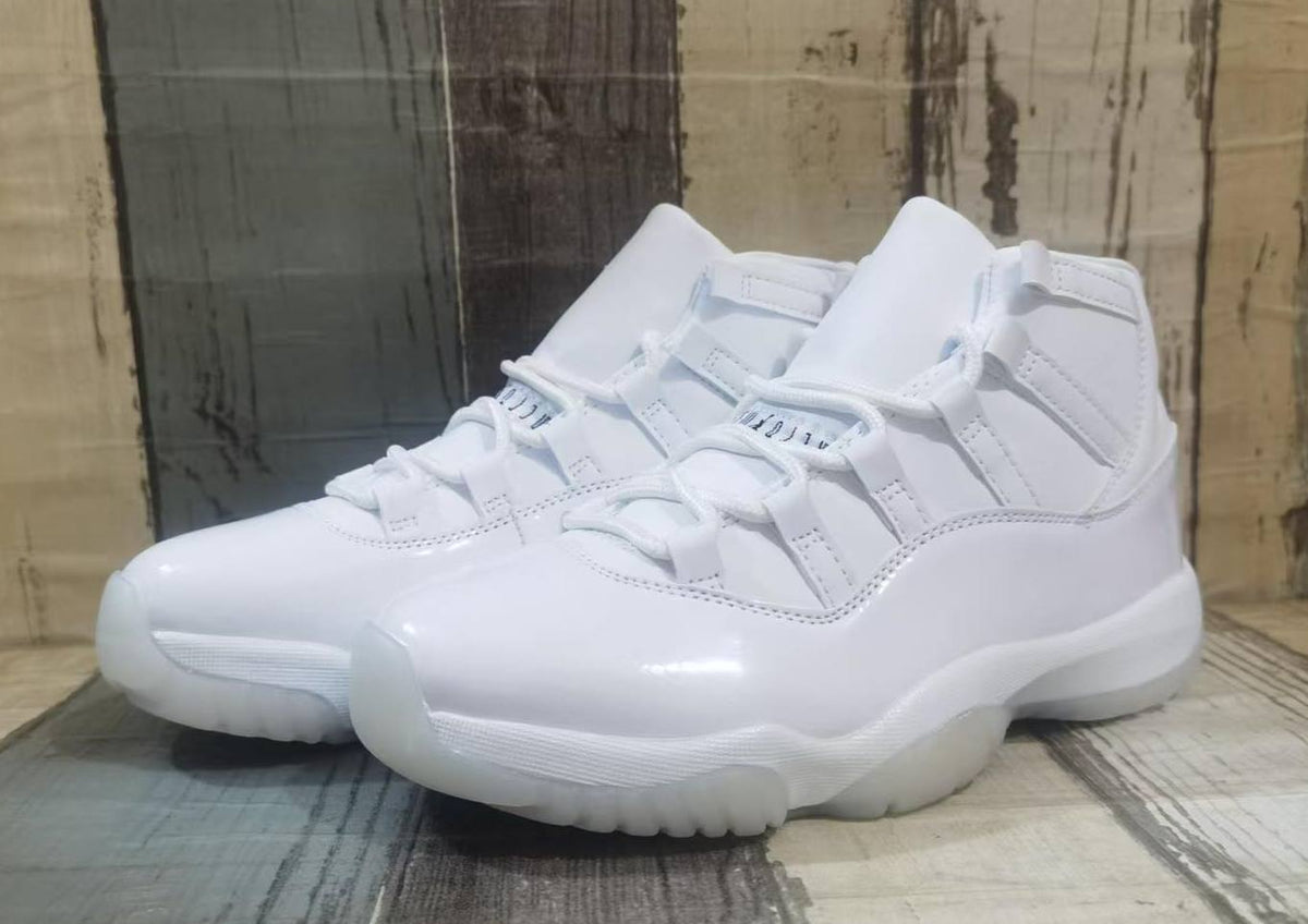 Air Jordan 11 Cream & Black Sneakers for Men & Women