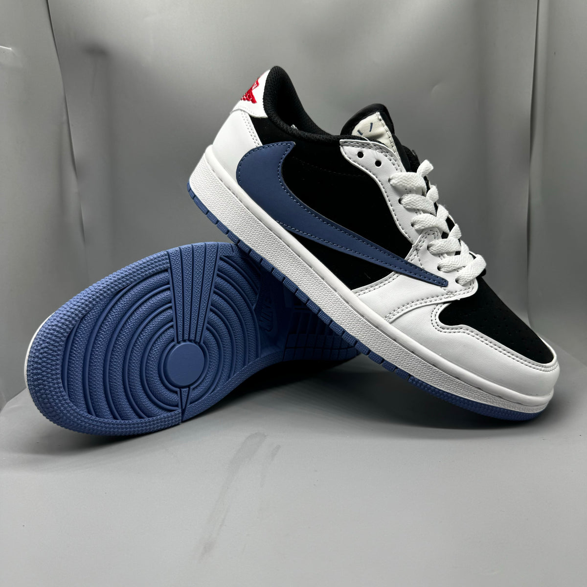 Travis Scott x Air Jordan 1 Retro Low OG SP Lightning – White, Black & Blue