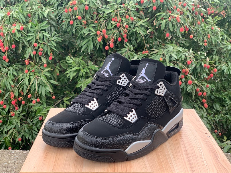Air Jordan 4 “Spotlight” Sneakers – Black & White